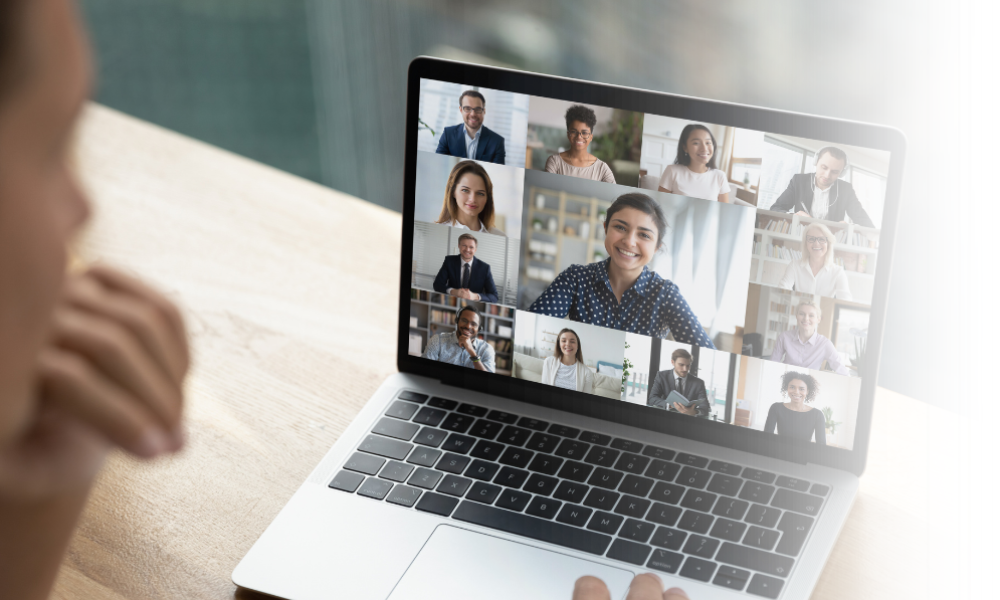 Blurred person in front of a computer screen, on a conference call